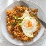 kimchi rice with a fried egg on top.