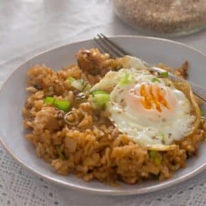 korean fried rice bokkeumbap served with a fried rice on top.