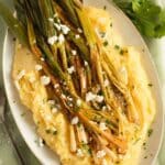 pinterest image with title roasted green onions.