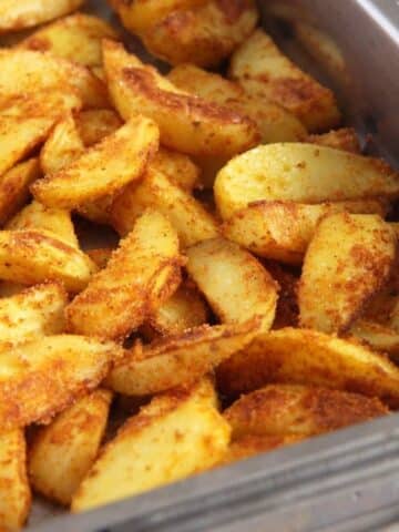 roasted polenta potatoes in a baking dish.