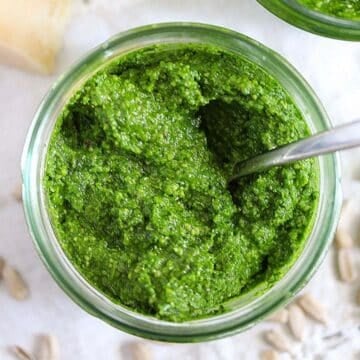 very green wild garlic pesto in a small jar.