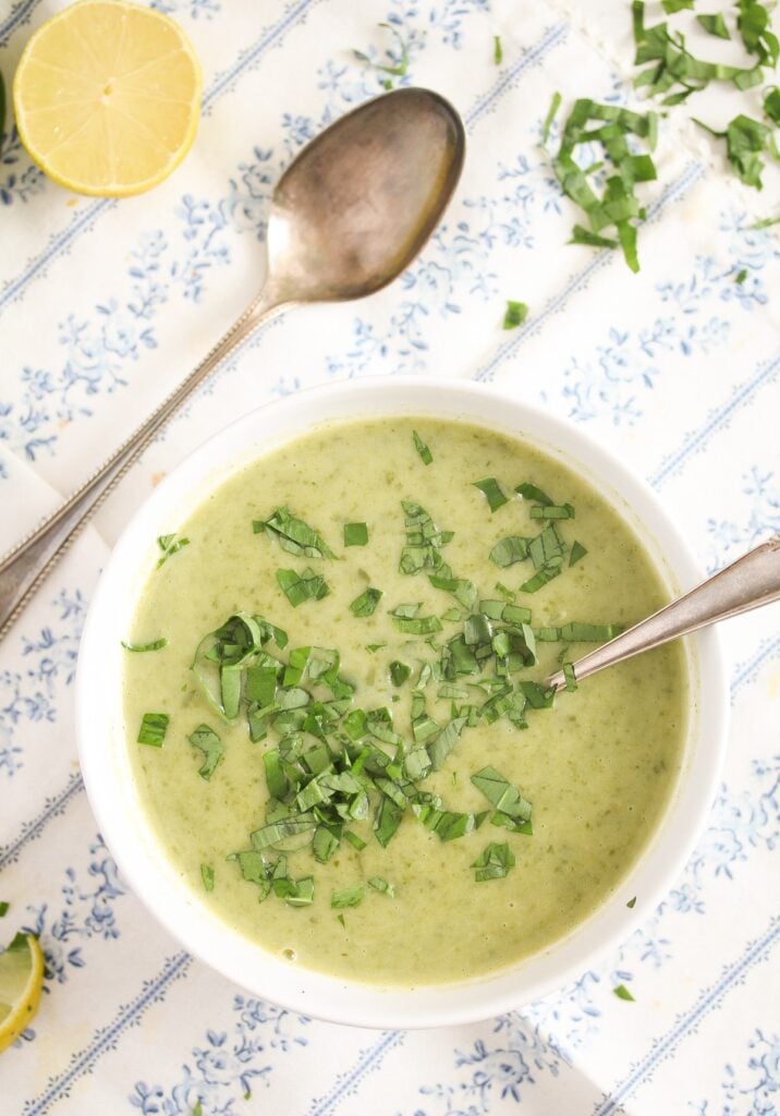 wild garlic soup with potatoes on the table with spoons