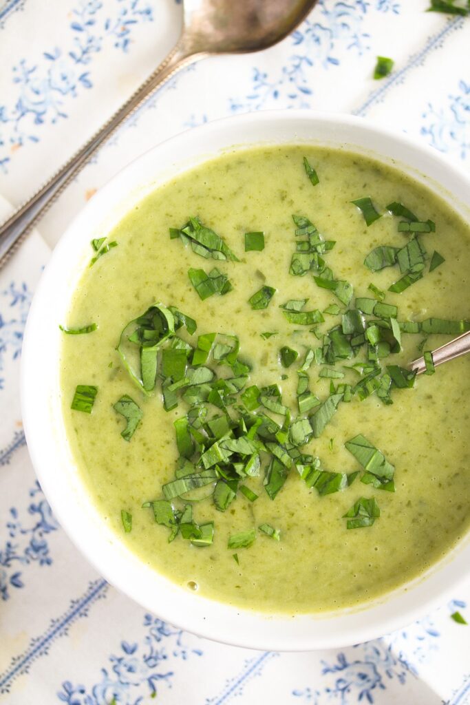 wild garlic and potato soup in a white bowl