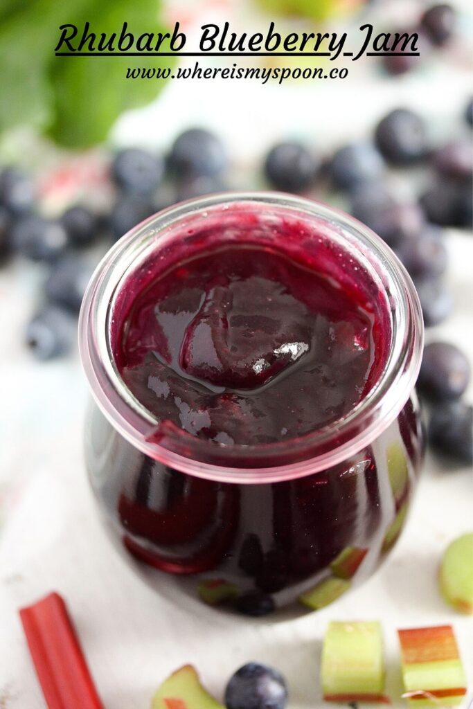 jar with glossy red preserves