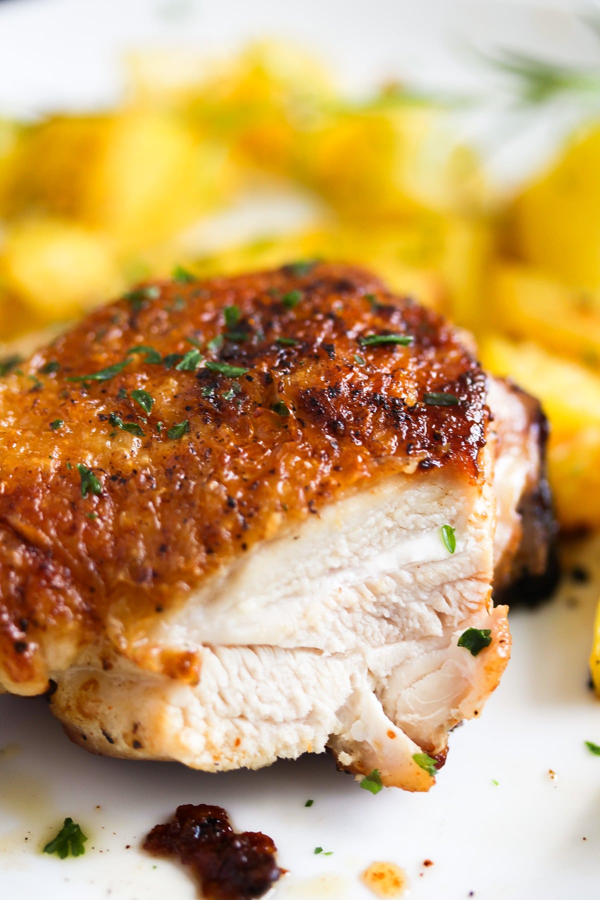 cut up chicken thigh with potatoes