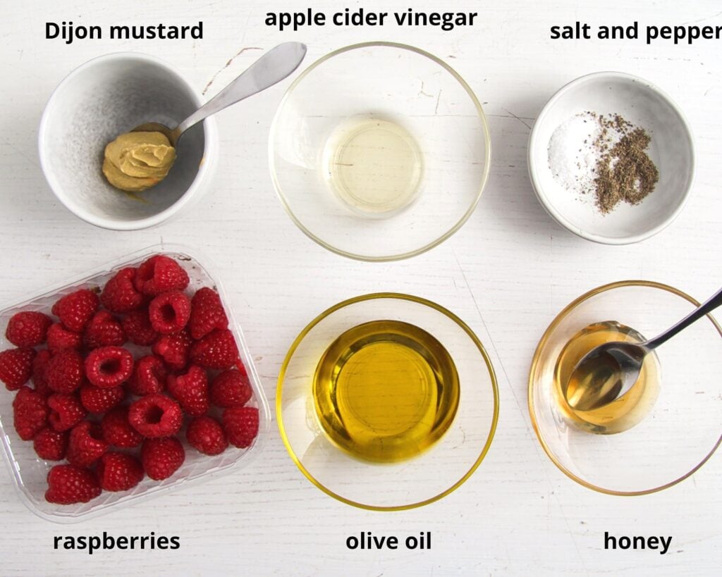 raspberries, oil, vinegar, honey, mustard for making salad dressing