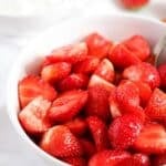 pin image with the title macerated strawberries.