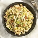 a bowl full of ramen napa cabbage salad in a bowl.