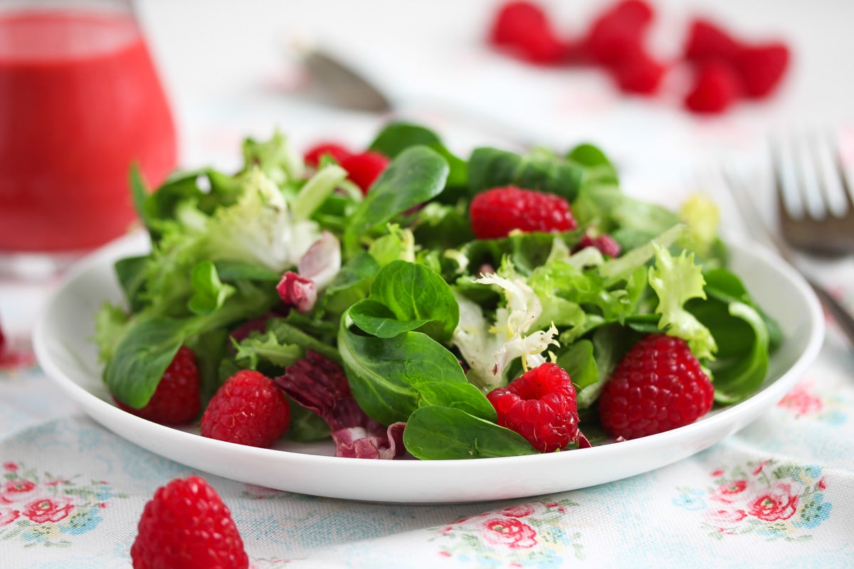 raspberry dressing with salad leaves and berries