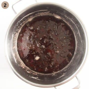 boiling rhubarb syrup made with peel in a large pot.