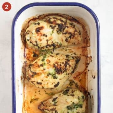 three roasted chicken breasts in a roasting tin.