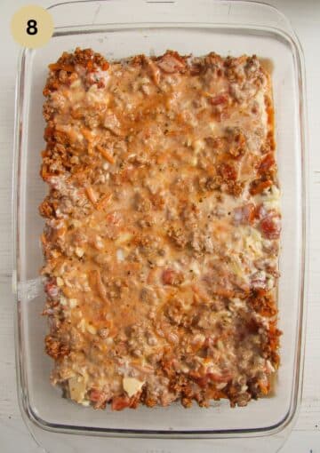 assembling lasagna layers in a bakind dish.