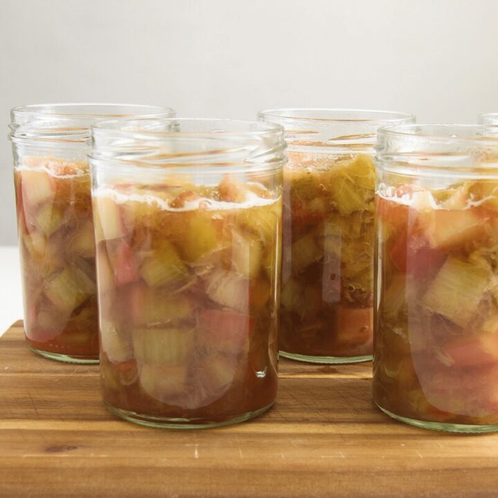 canning rhubarb in jars ready to be boiled