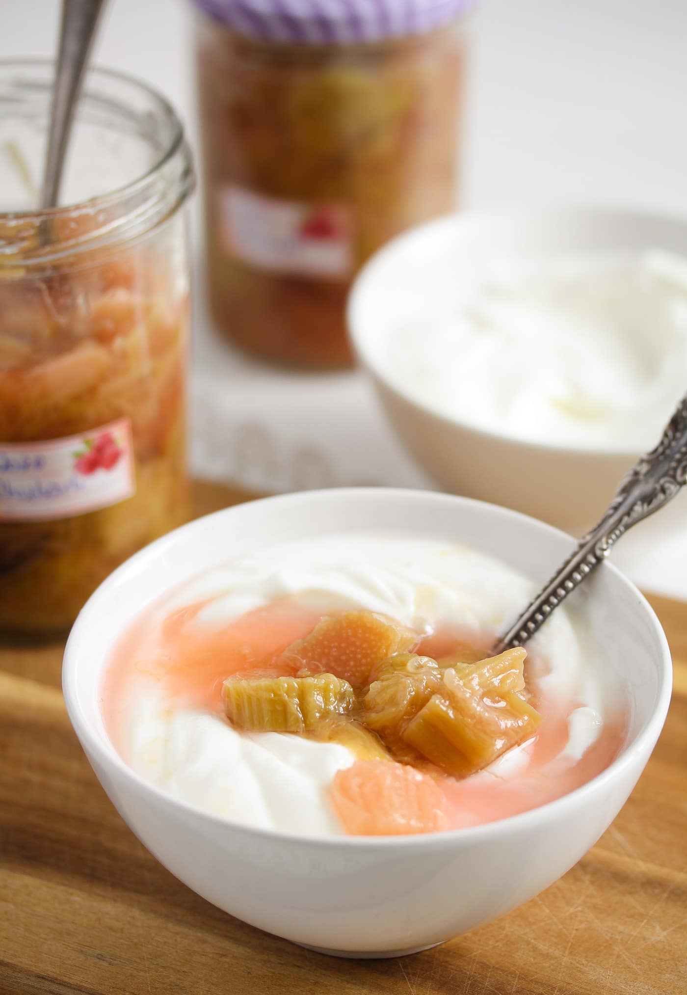 bowl of greek yogurt topped with fruit preserves