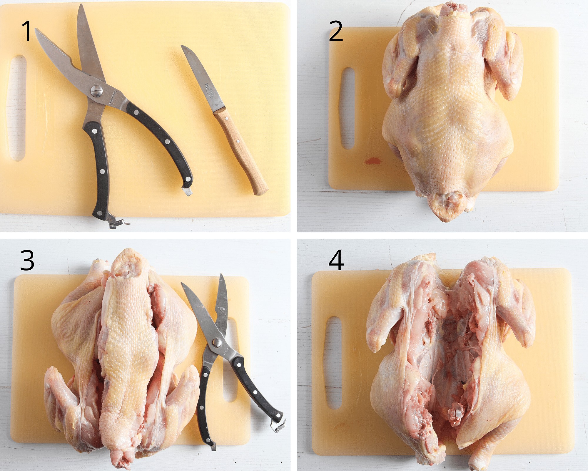 cutting a chicken in half with shears and knife