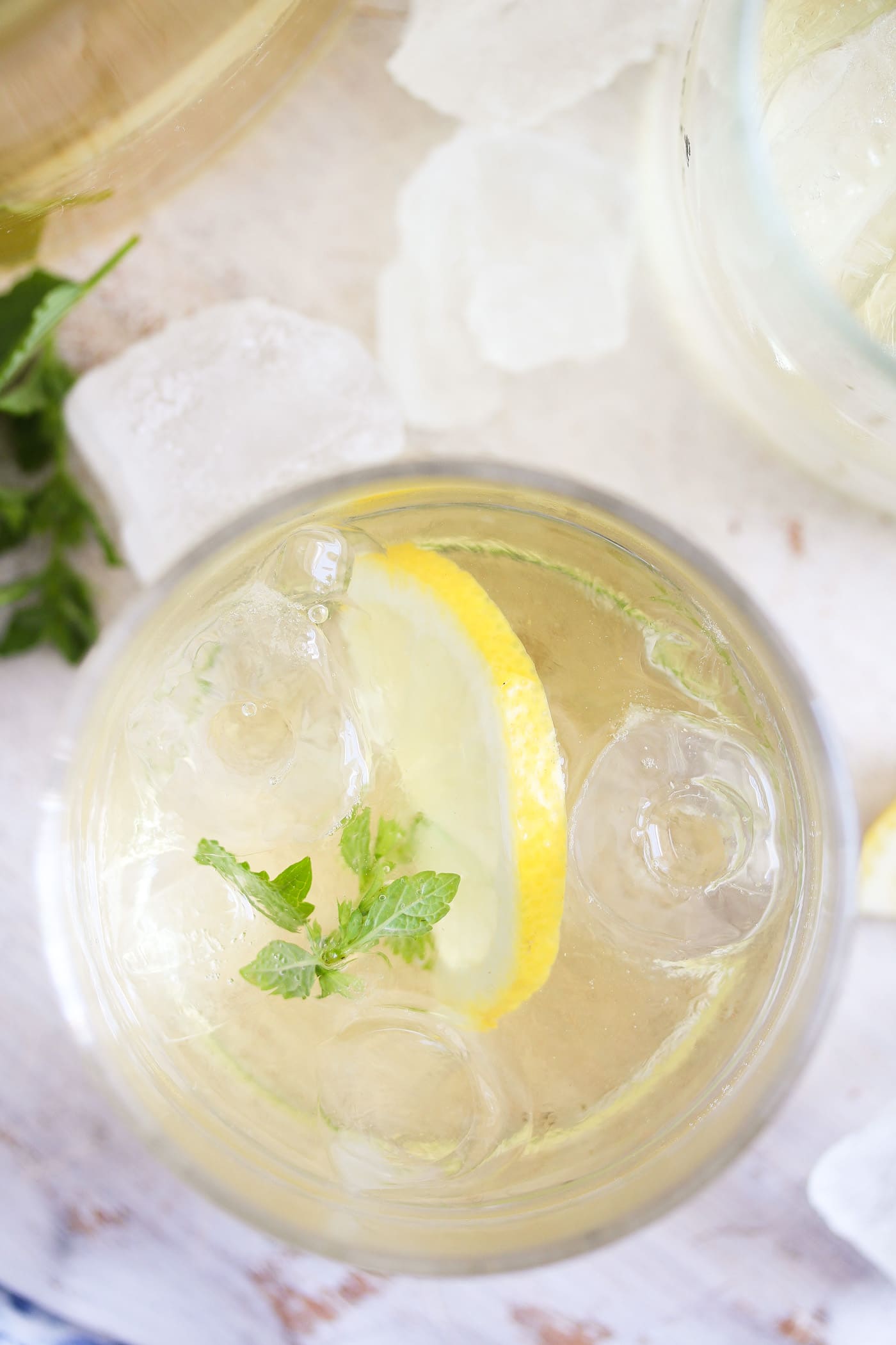 glass of liquor with ice seen from above