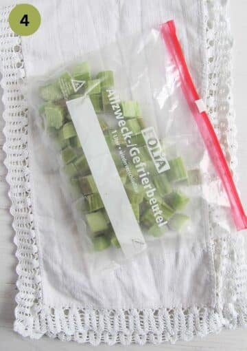 frozen rhubarb pieces in a freezer bag.