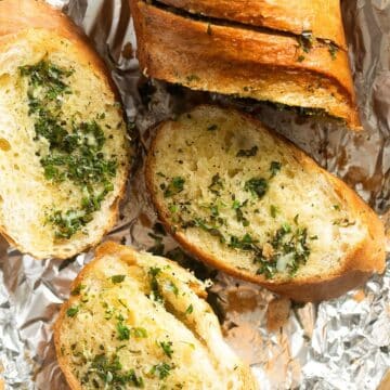 garlic bread baguette three slices.