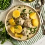 königsberger klopse or german meatballs in caper sauce served with boiled potatoes.
