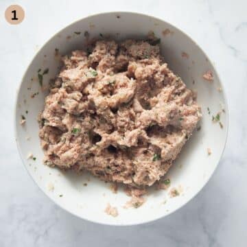 mixture for making german meatballs in a large bowl.
