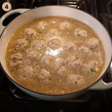 simmering königsberger klopse in broth.