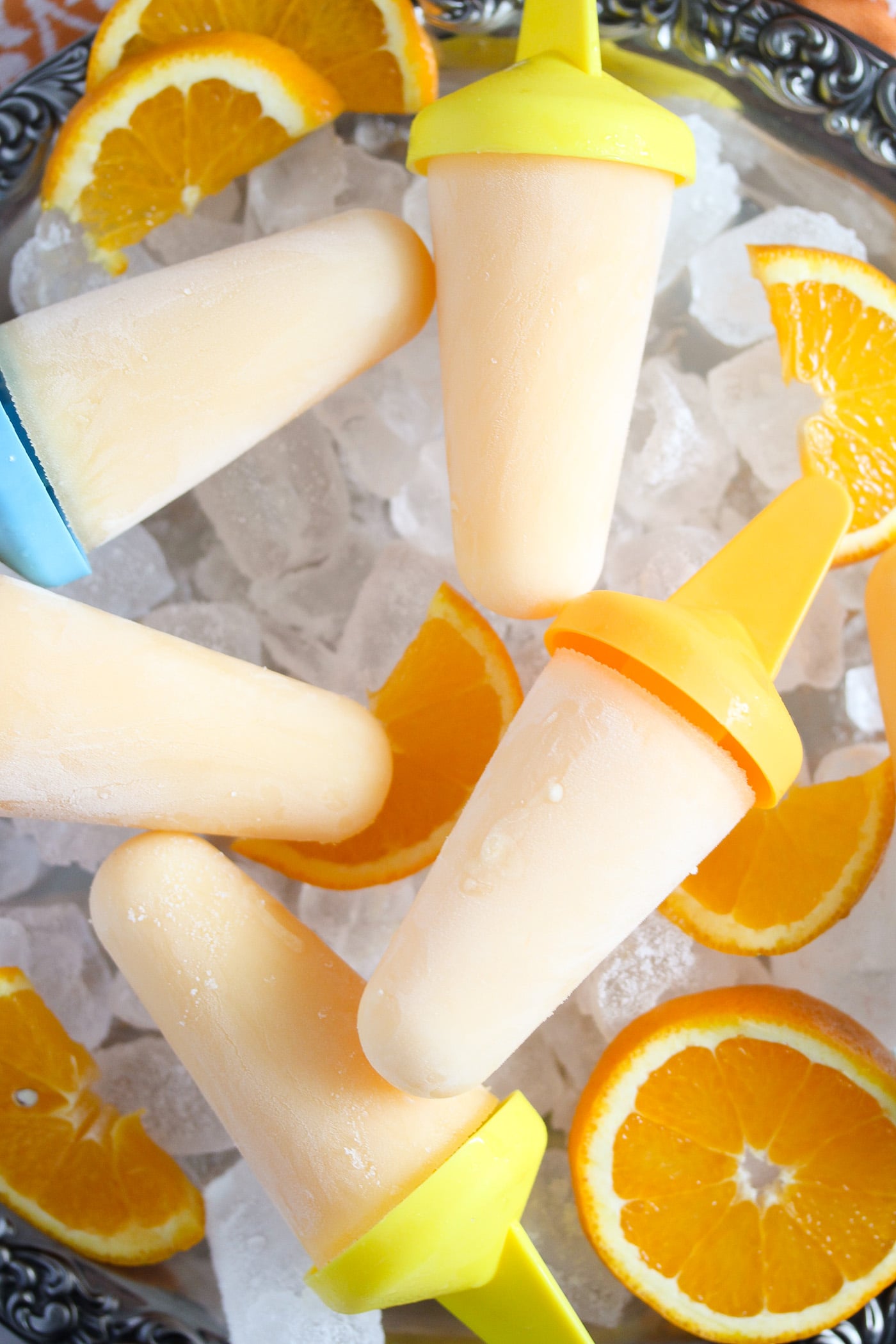 creamsicles with oranges on ice cubes