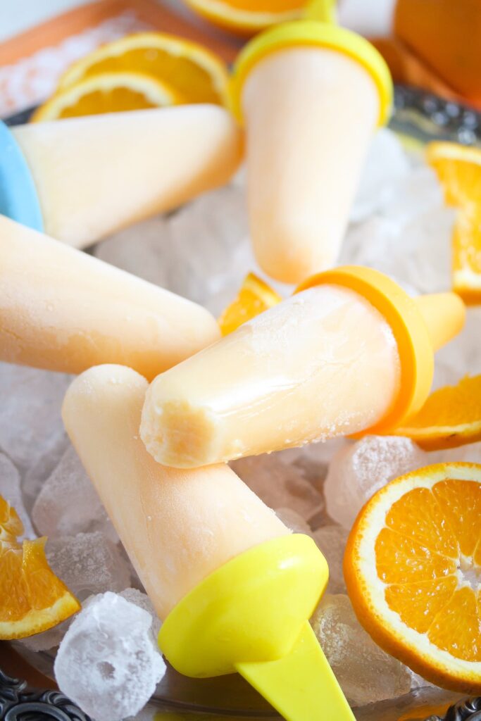 orange ice pops with orange slices