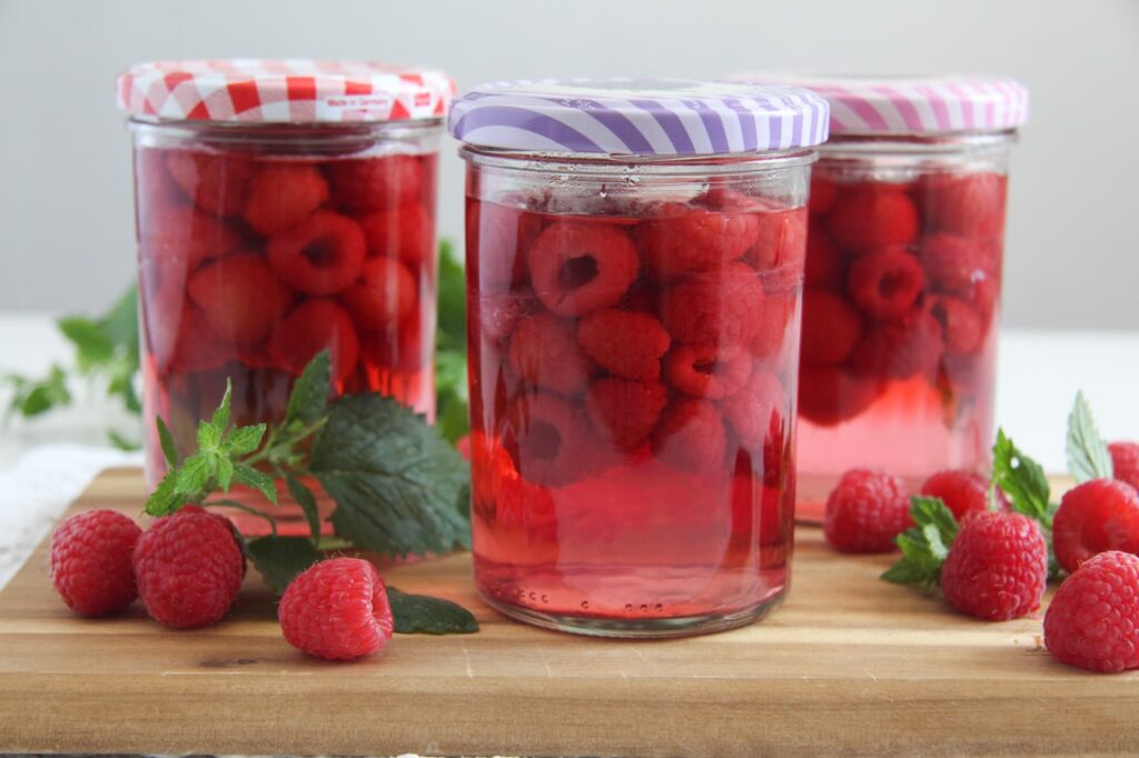 raspberries canned with sugar and water