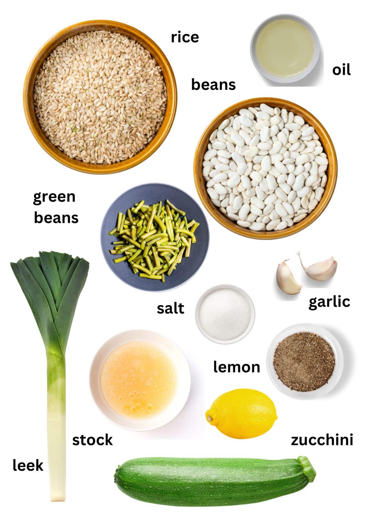listed ingredients in bowls for making soup with rice, beans, leeks, zucchini and green beans.