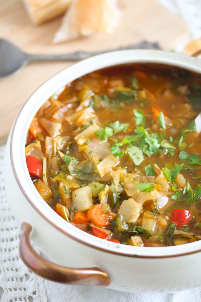 spanish soup with vegetables in a serving bowl