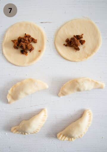 filling, folding and crimping empanadas.