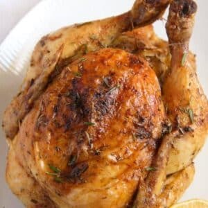 whole roasted chicken with crispy, golden brown skin.