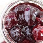 preserving cherries in thick syrup in a jar
