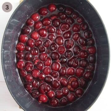 cooking cherries in a large oval dutch oven.