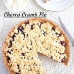 cherry tart seen from above served with whipped cream