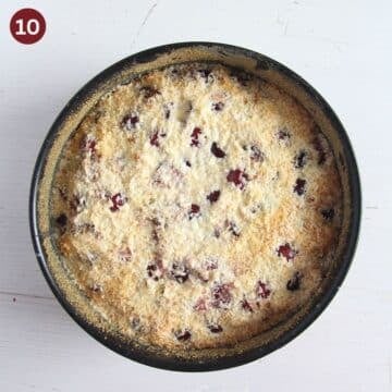 cherry coconut cake soaked wiith cream in a springform.