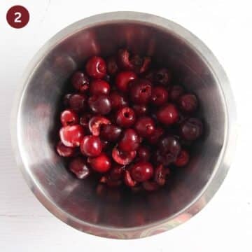 pitted cherries in a bowl.