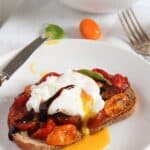 pinterest image with the title egg and roasted tomato toast.