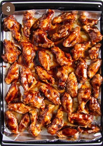 unbaked hoisin wings on baking sheet lined with foil.