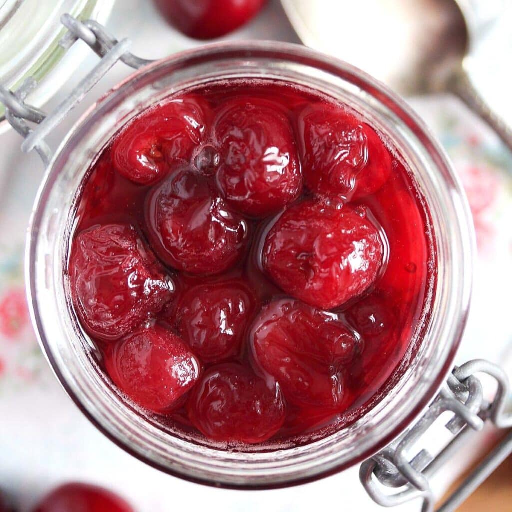 jar of cherries in kirsch seen from above