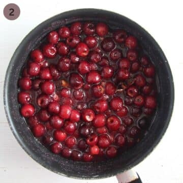 cherries in kirsch cooling in a large saucepan.