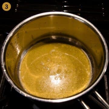 melted butter in a small saucepan for making bechamel.