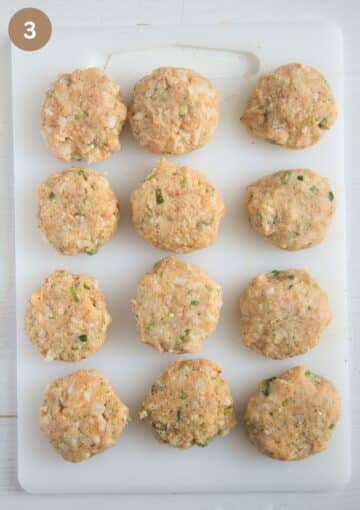 shaped patties made with cauliflower, potatoes and cheese on a cutting board.