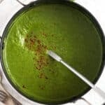 cream of broccoli soup with coconut milk in a pot.