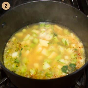 adding broth to a pot with potatoes and broccoli to make soup.