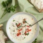 pin image with the title the best garlic sour cream sauce.