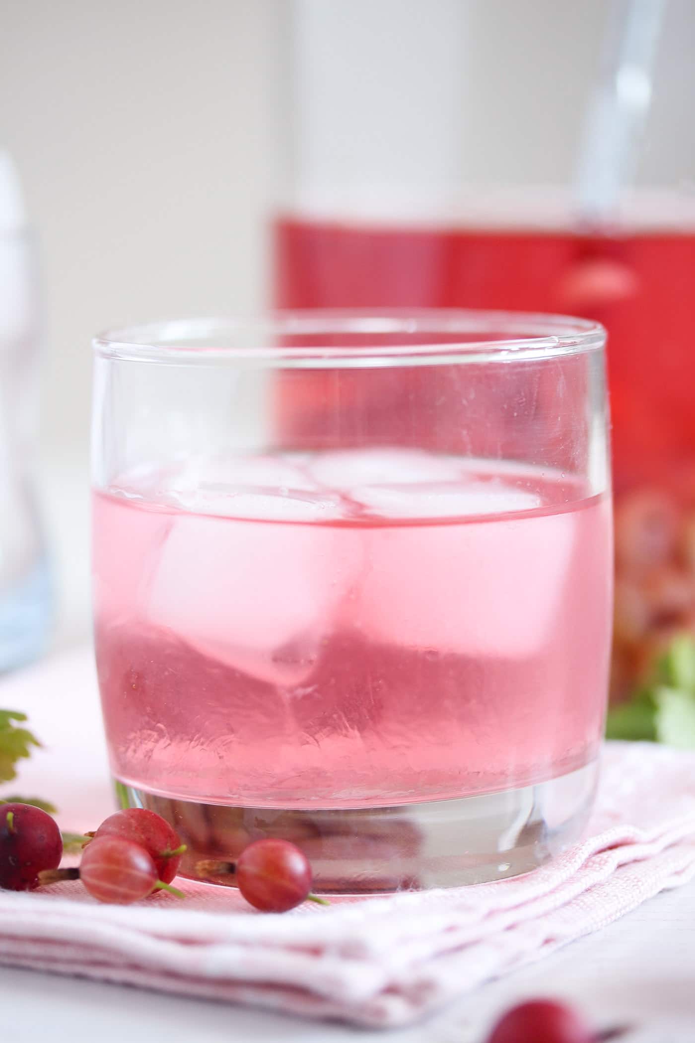 gooseberry flavored gin served on ice cubes