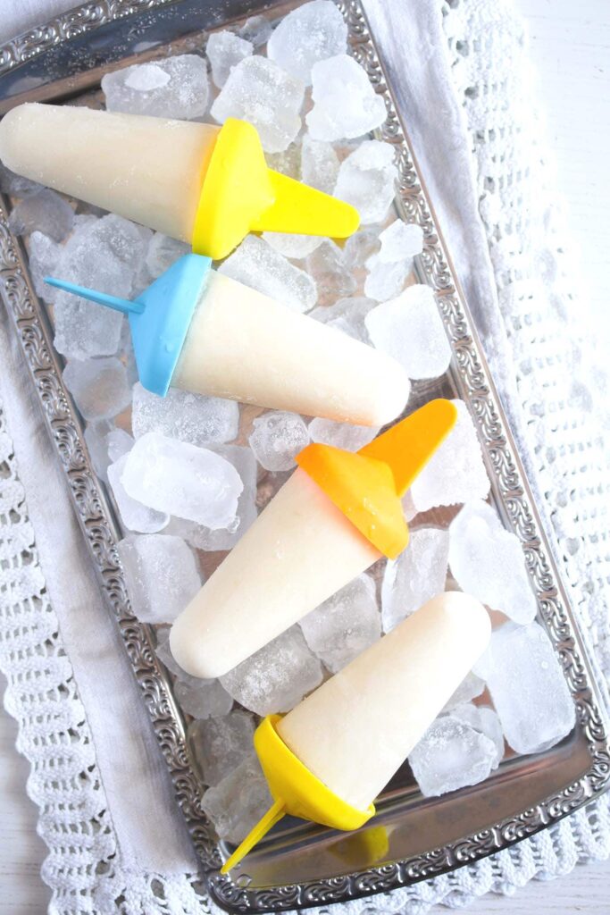 citrus pops with yogurt on ice cubes