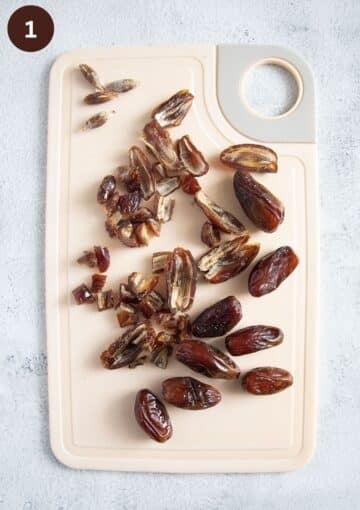 chopping dates on a cutting board.