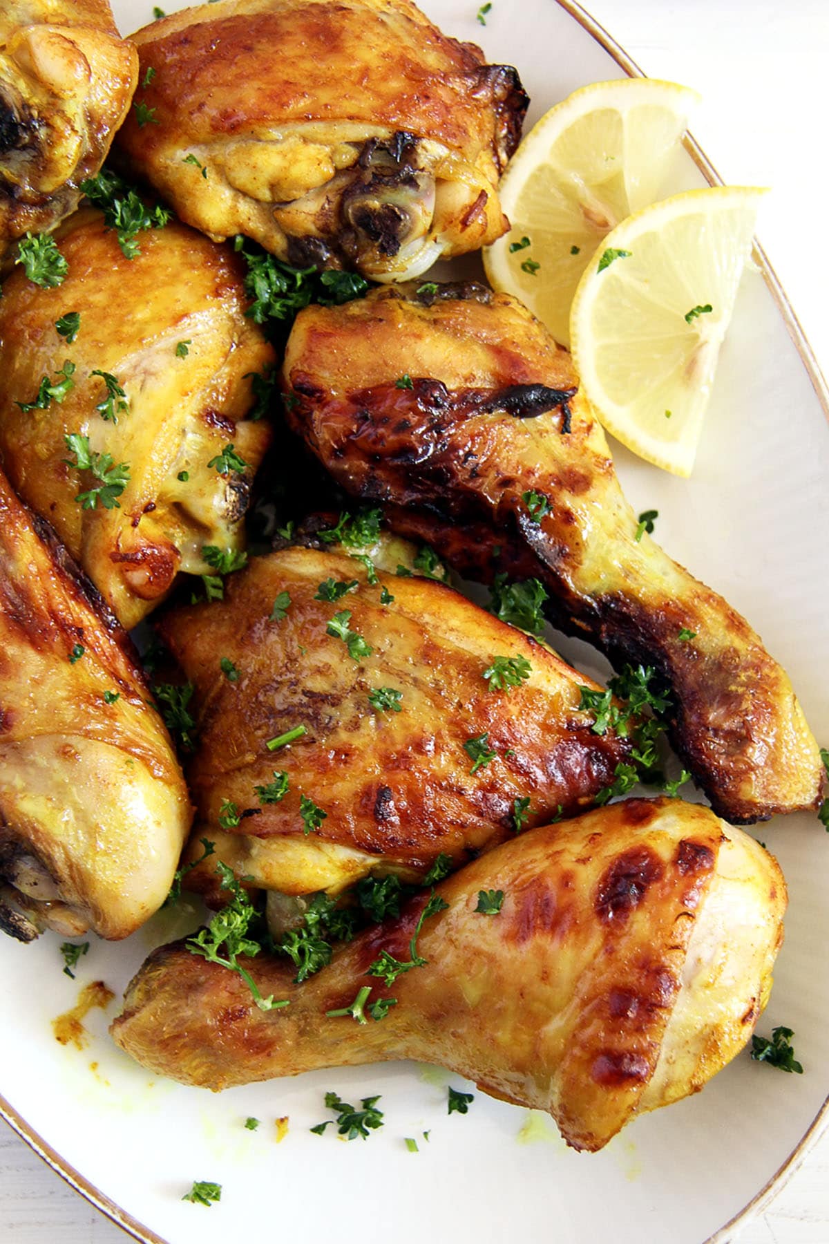chicken drumsticks and thighs glazed with honey and turmeric.